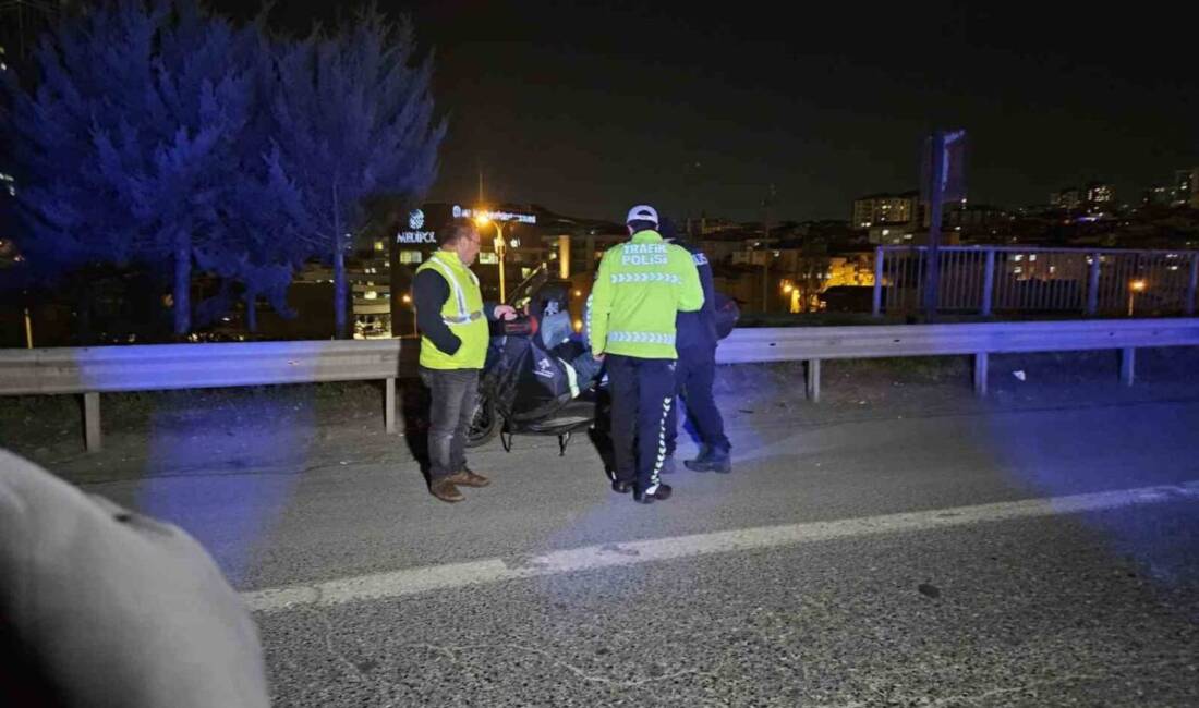 TEM Otoyolu yan yolda seyreden otomobil, yolun ortasında yerde yatan